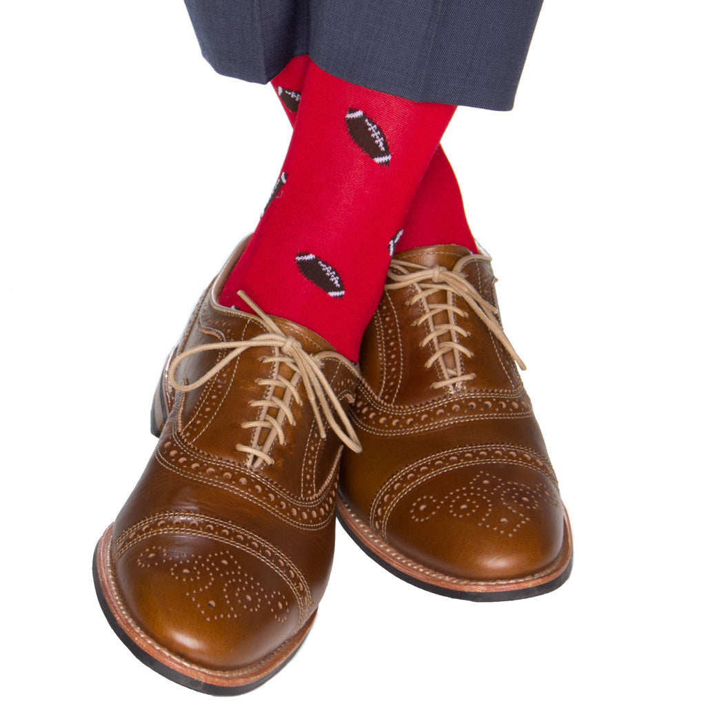 red sock with footballls