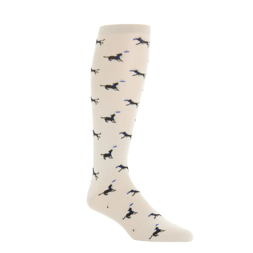 over-the-calf tan sock with black dog catching frisbee