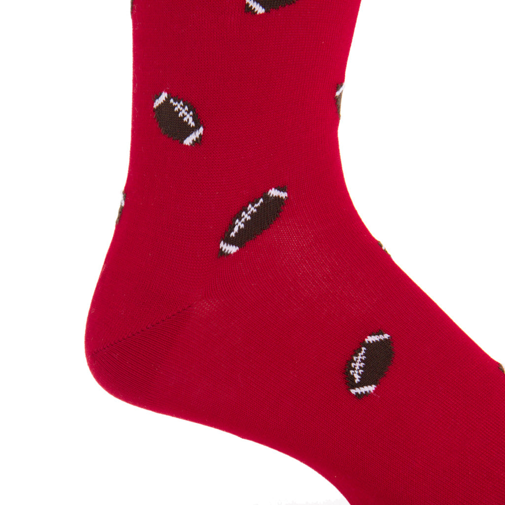 red sock with footballls
