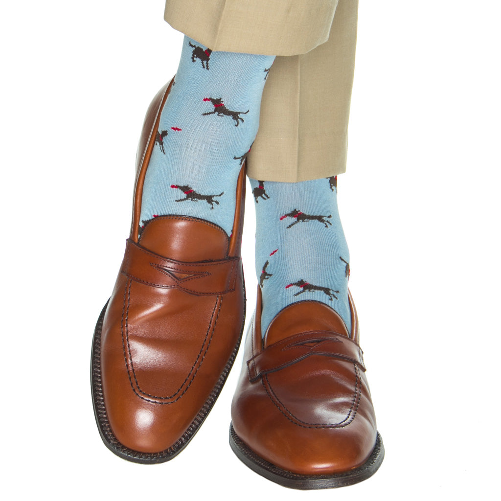 sky blue sock with brown dog catching a frisbee cotton 